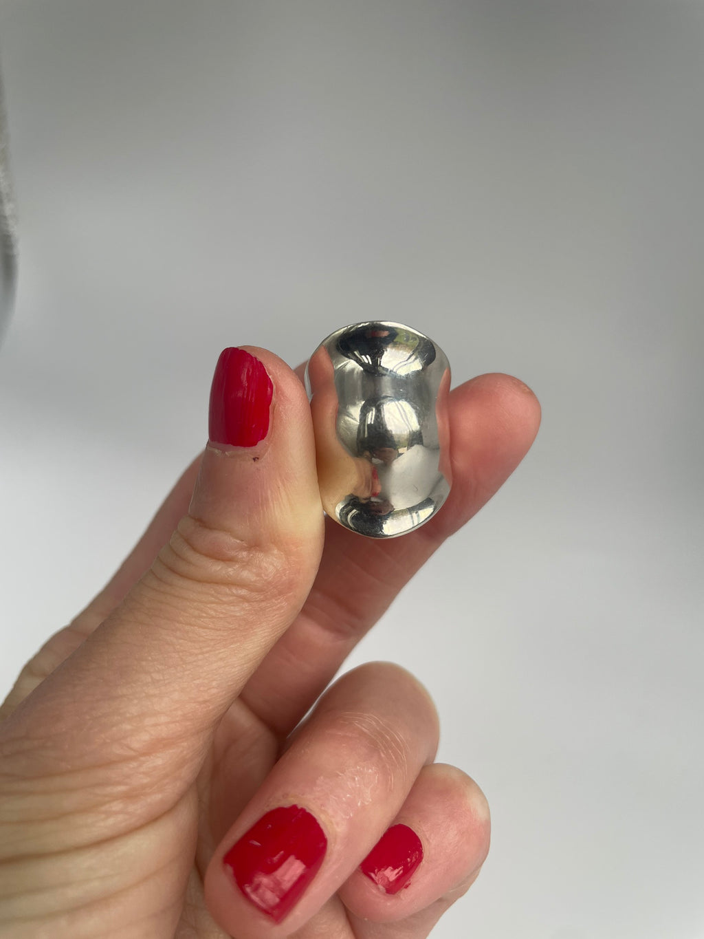 Close view of the mirror finish on the wavy dome ring